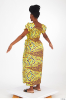  Dina Moses A poses dressed standing whole body yellow long decora apparel african dress 0004.jpg